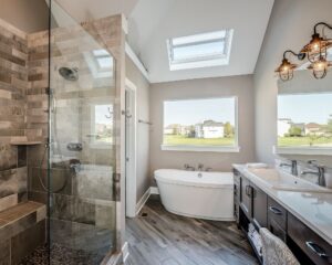 A spacious bathroom design with a walk-in shower and tub.
